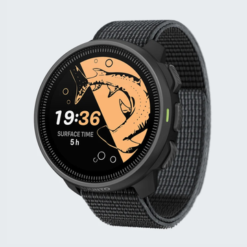 Suunto Nautic S with a black strap on a light gray background